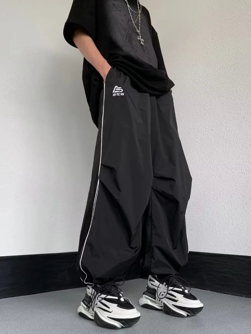 Men's Striped Wide Leg Pants in Black, front view