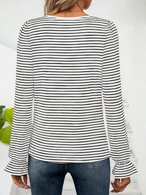 Striped white and black blouse with ruffle cuffs and square neckline.