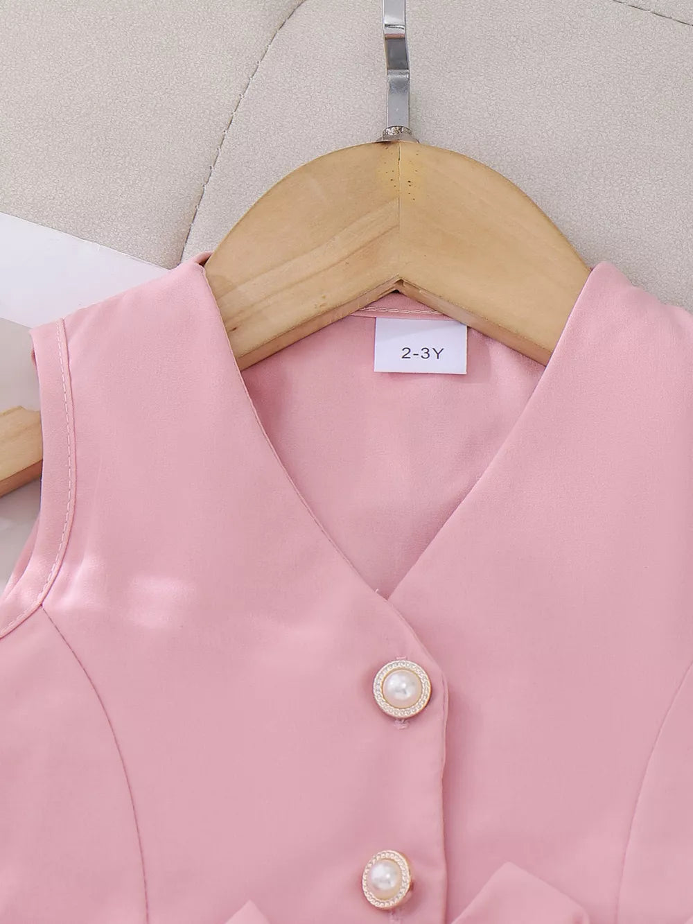 Children's Bow Button Up Vest And Skirt Set in Pink, side view