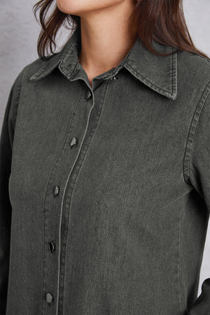 Dark gray washed denim shirt with pointed collar and button front.