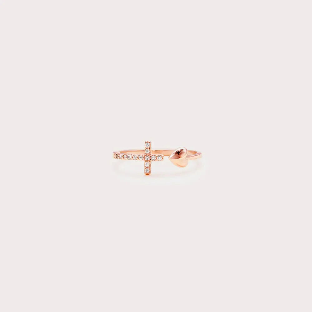 Rose gold ring with pave diamond cross and heart detail