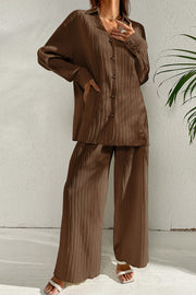Brown pleated co-ord set with button-down shirt and wide leg trousers