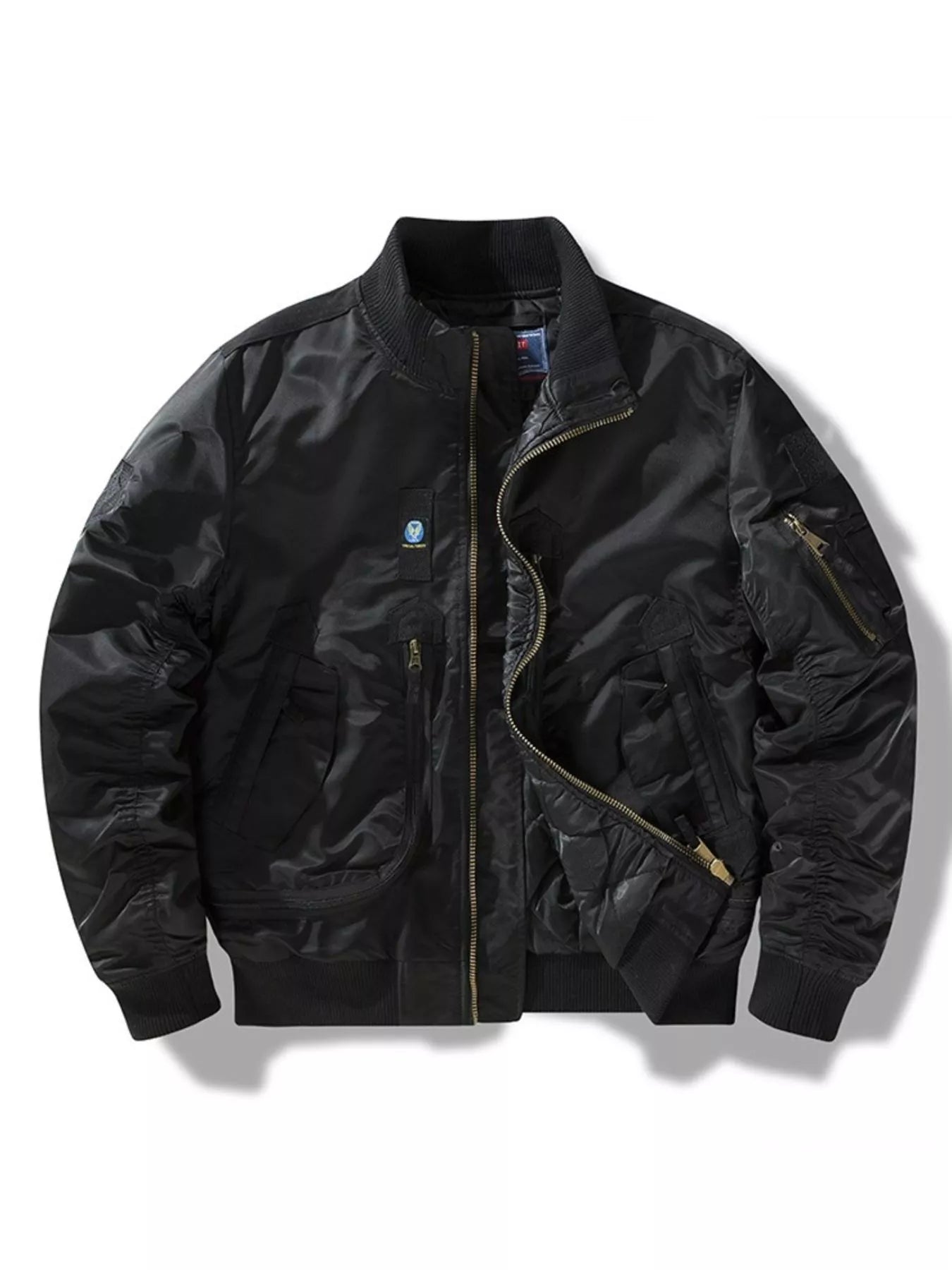 Men's black bomber jacket with full zip, ribbed cuffs, and multiple zippered pockets.