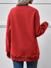 Deep Red crewneck sweatshirt with ribbed cuffs and hem, relaxed fit.