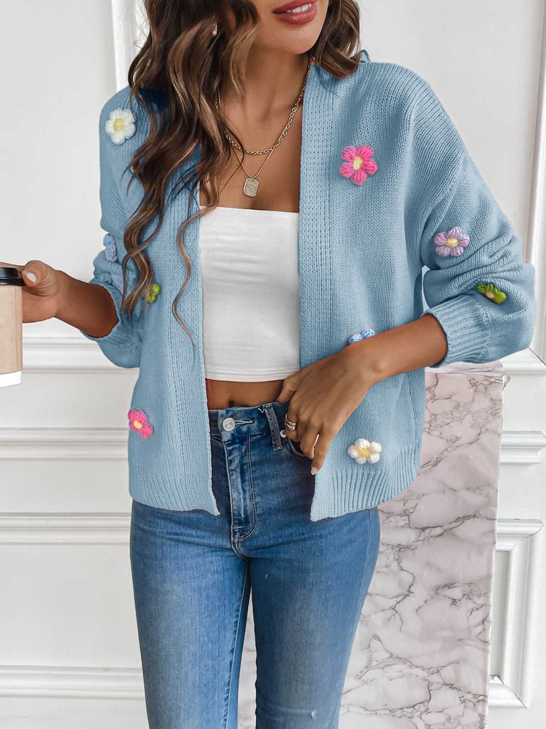 Light Blue embroidered blossom open-front knit cardigan with 3D flowers.
