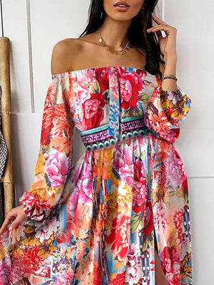 Vibrant off-shoulder maxi dress with balloon sleeves and a high slit, featuring a colorful floral print.