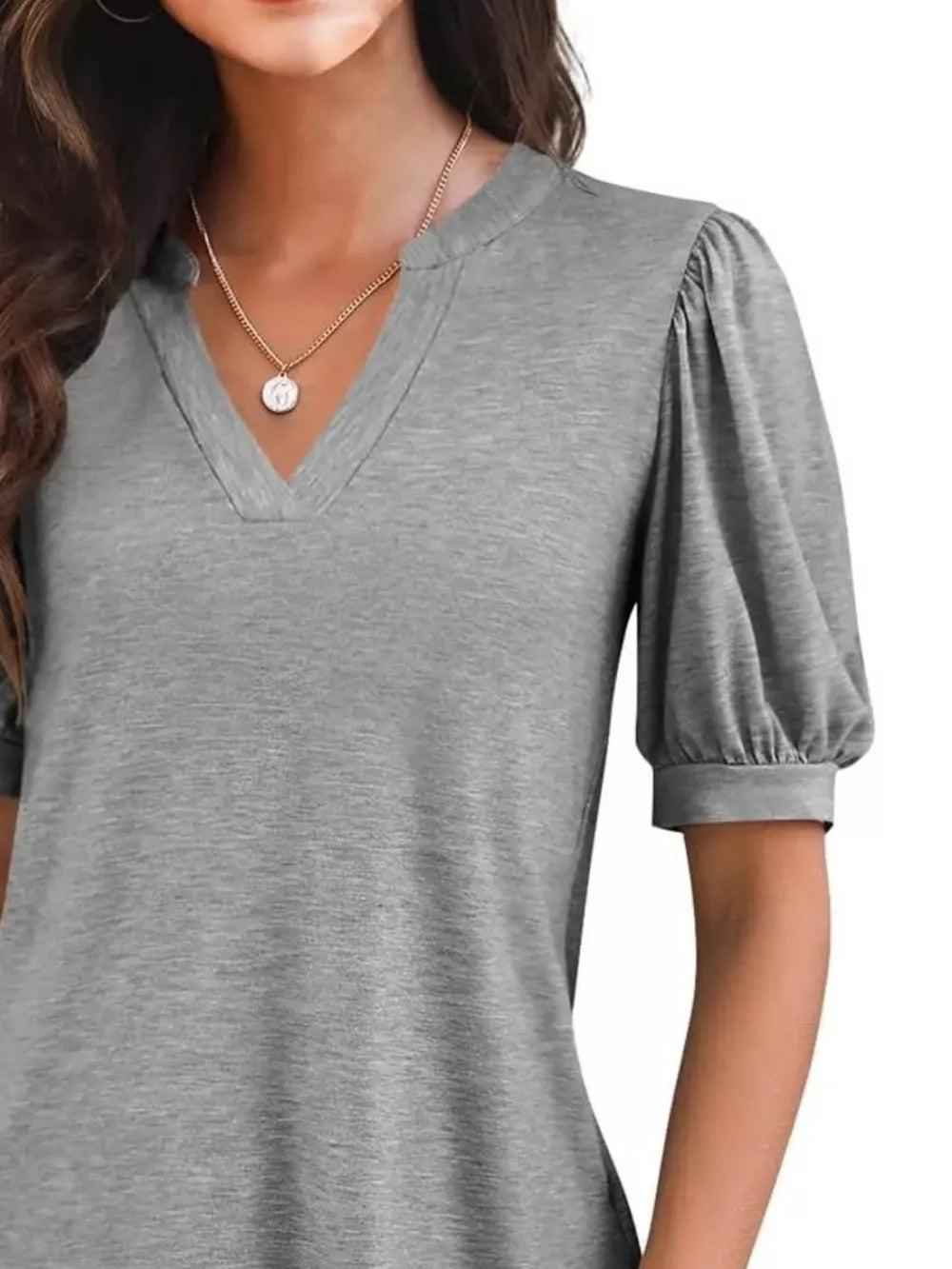 Dark Gray t-shirt with notched V-neck and puff sleeves.
