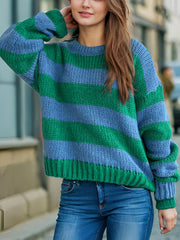 Chunky knit jumper with blue and green Breton stripes, crew neck, and long sleeves.