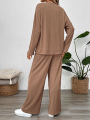 Camel textured henley loungewear set with long sleeves and wide-leg pants.