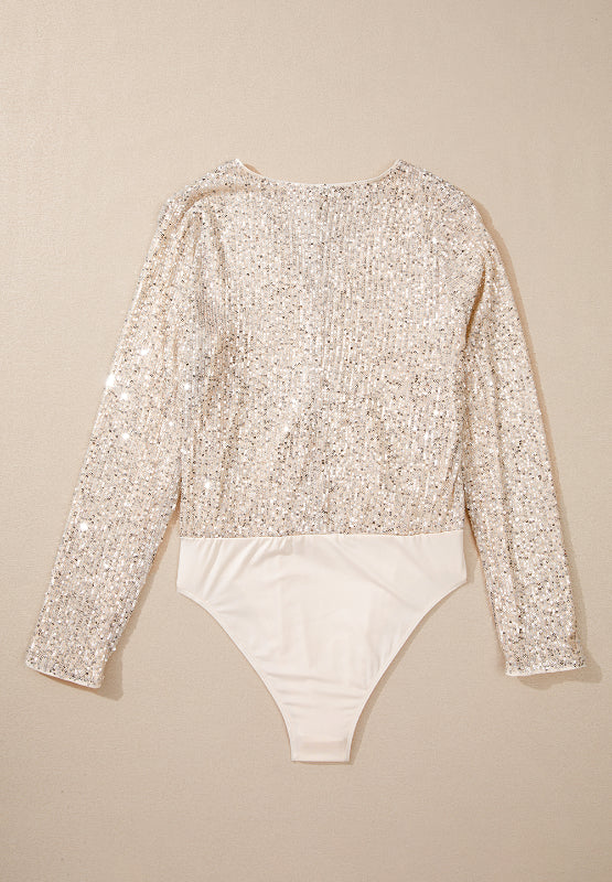 Ivory sequin long sleeve bodysuit with a deep V-neck and a smooth bottom.