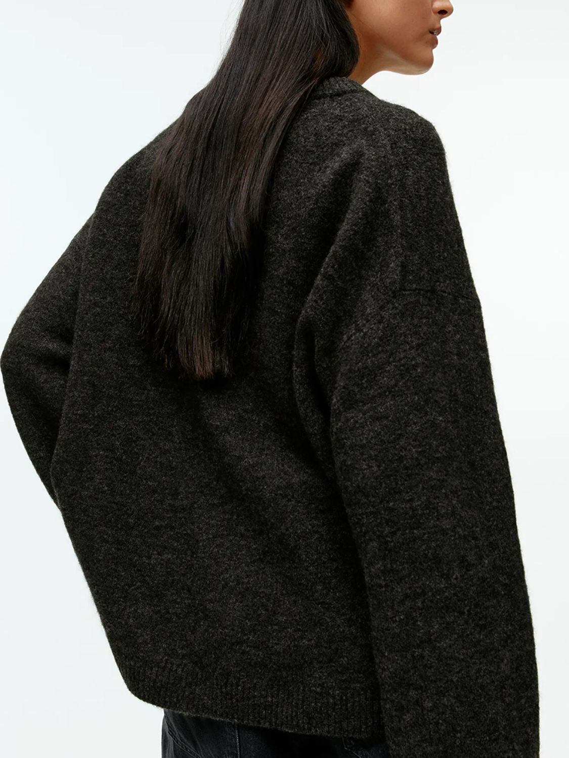 Oversized crewneck sweater in black brushed knit with a relaxed fit.