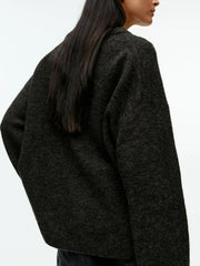 Oversized crewneck sweater in black brushed knit with a relaxed fit.
