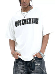 White cotton oversized t-shirt with black textured logo graphic on chest.