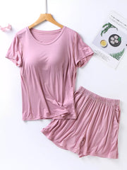 Pink short sleeve pajama set with shorts and pockets
