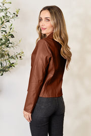 Biker jacket in Dark Camel faux leather with a stand-up collar and fitted cut.