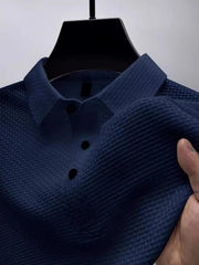 Blue textured weave polo shirt with maxi collar and black buttons.