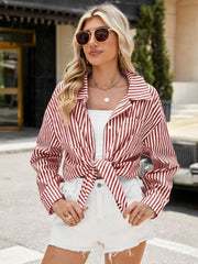 Striped tie-front oversized shirt in scarlet with buttoned front and pockets.