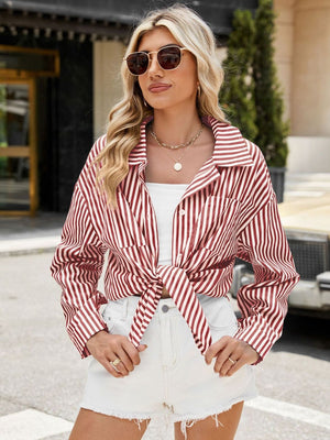 Striped tie-front oversized shirt in scarlet with buttoned front and pockets.