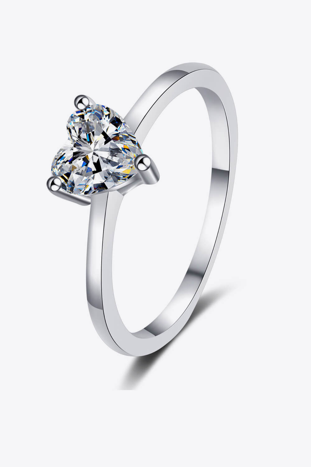 Silver ring with a heart-cut moissanite solitaire stone