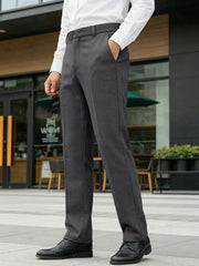 Men's classic fit dress pants in dark gray with pockets and a straight leg cut.