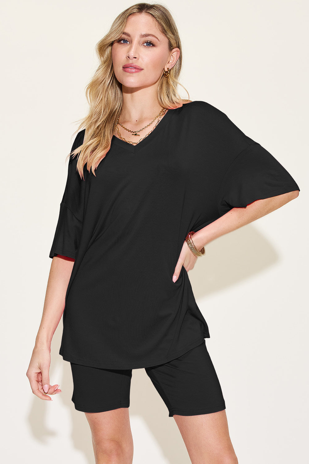 Black bamboo loungewear set with relaxed fit v-neck tee and bike shorts