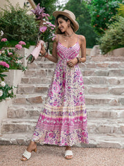 Pink floral print viscose maxi dress with spaghetti straps and drawstring waist.