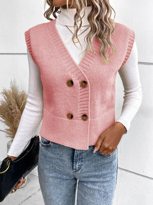 Dusty pink double-breasted knit vest with ribbed trim and buttons.