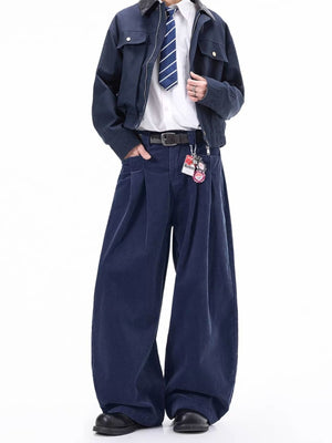 Men's navy blue wide leg corduroy sweatpants with pleats.