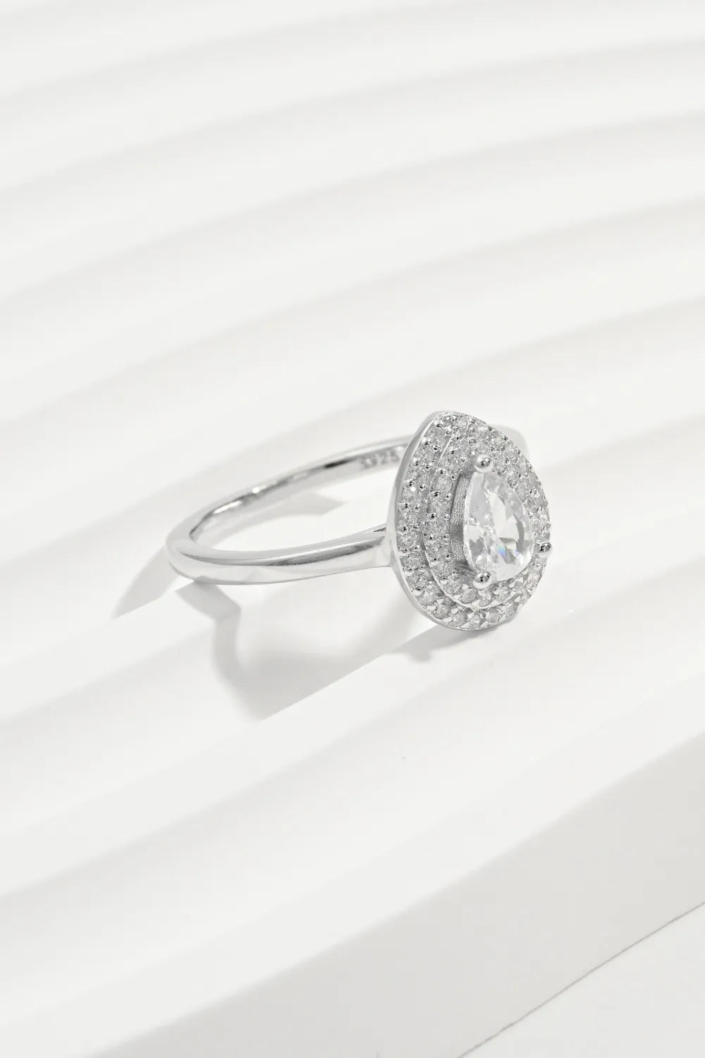 Silver double halo pear cut ring with clear stones