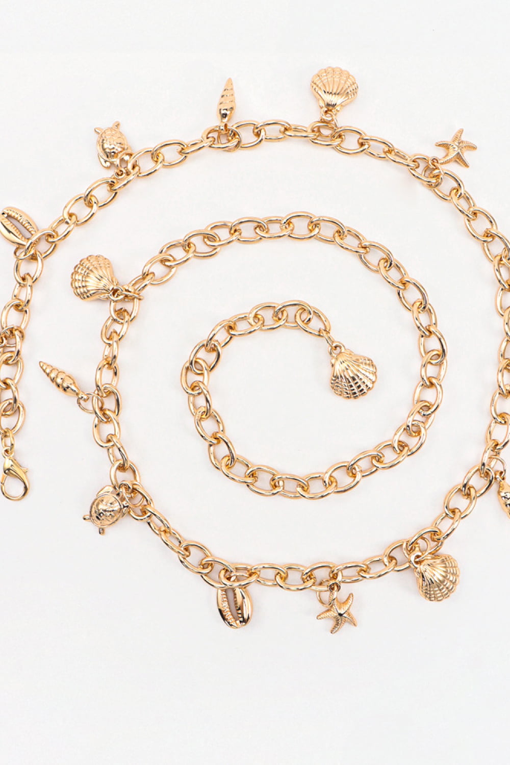 Gold chain belt with seashell, starfish, turtle, and conch charms
