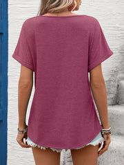 Pink relaxed fit t-shirt with cuffed short sleeves and a curved hem.