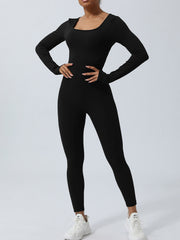 Black long sleeve sculpting jumpsuit with square neckline and full length leggings.