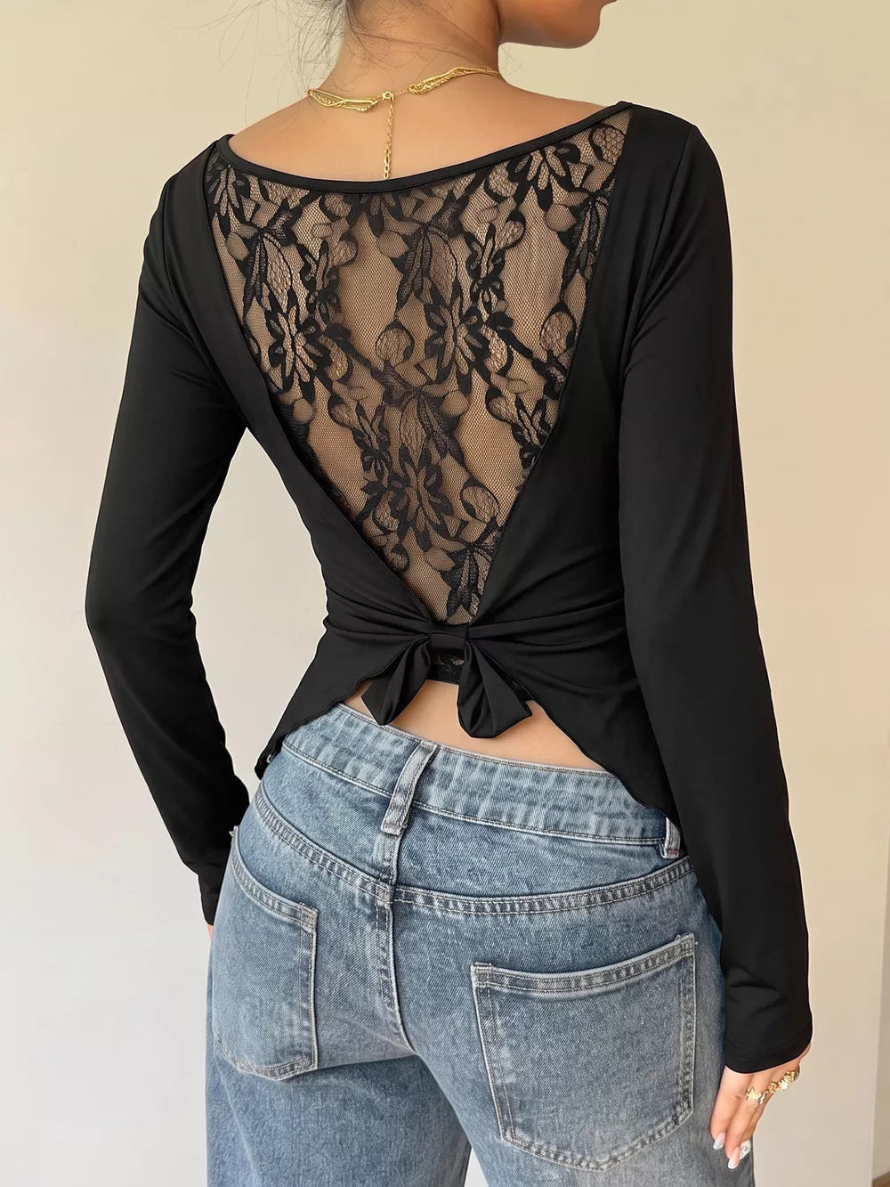 Lace Back Tie Long Sleeve Top in Black, front view
