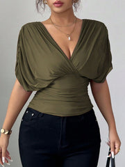 Army green ruched surplice dolman sleeve tunic with deep V-neck