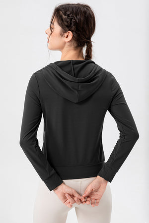 Black performance fit hoodie with long sleeves and a hood, shown from the back.