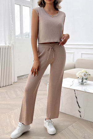 Taupe ribbed knit lounge set with cropped sleeveless top and wide-leg pants with drawstring waist.