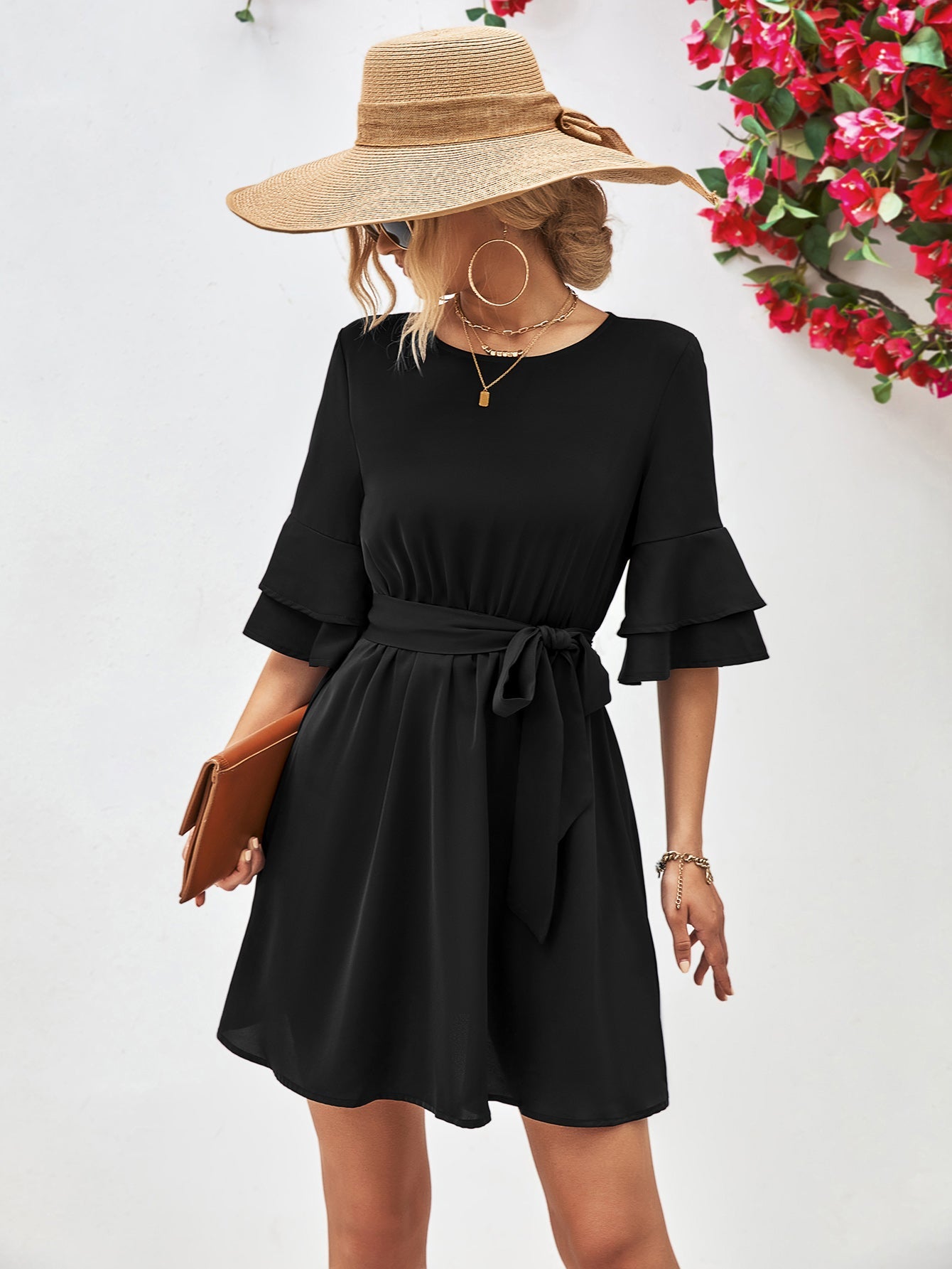 Black tiered sleeve tie-waist mini dress with a-line skirt and belt.