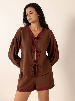 Brown linen tie-front pajama set with scallop trim and balloon sleeves
