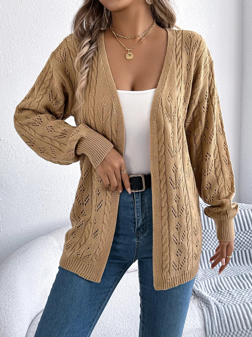 Khaki openwork acrylic long sleeve cardigan with cable knit details.