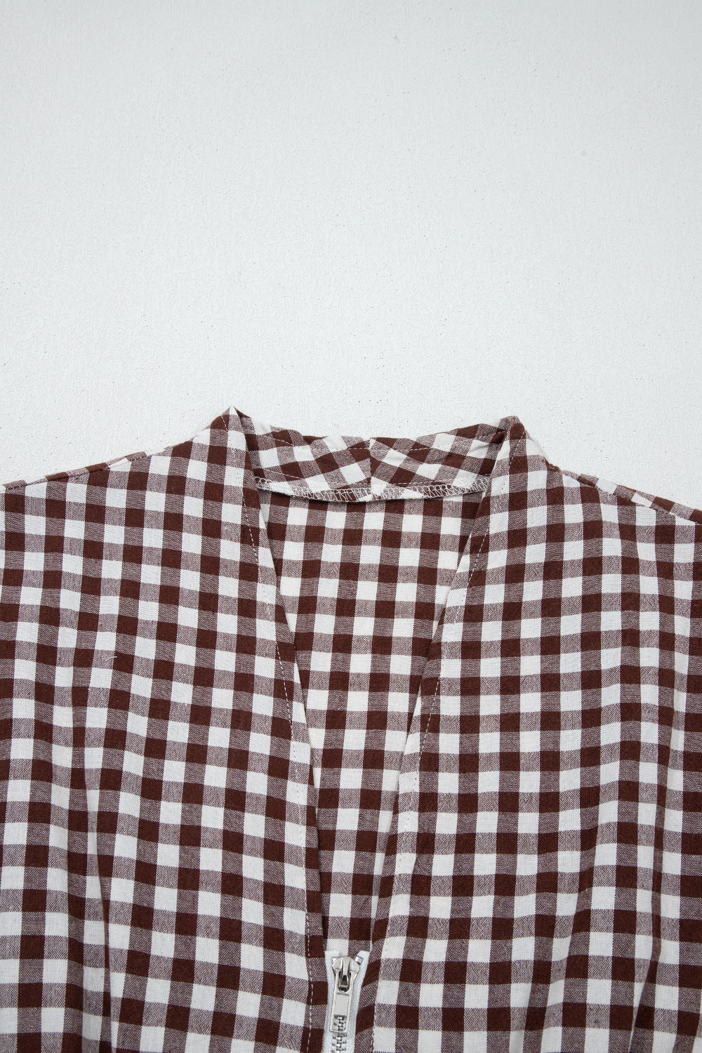 Gingham zip-front midi dress in taupe cotton with a V-neckline.