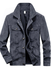 Grey corduroy button-down jacket with chest pockets and button closure.