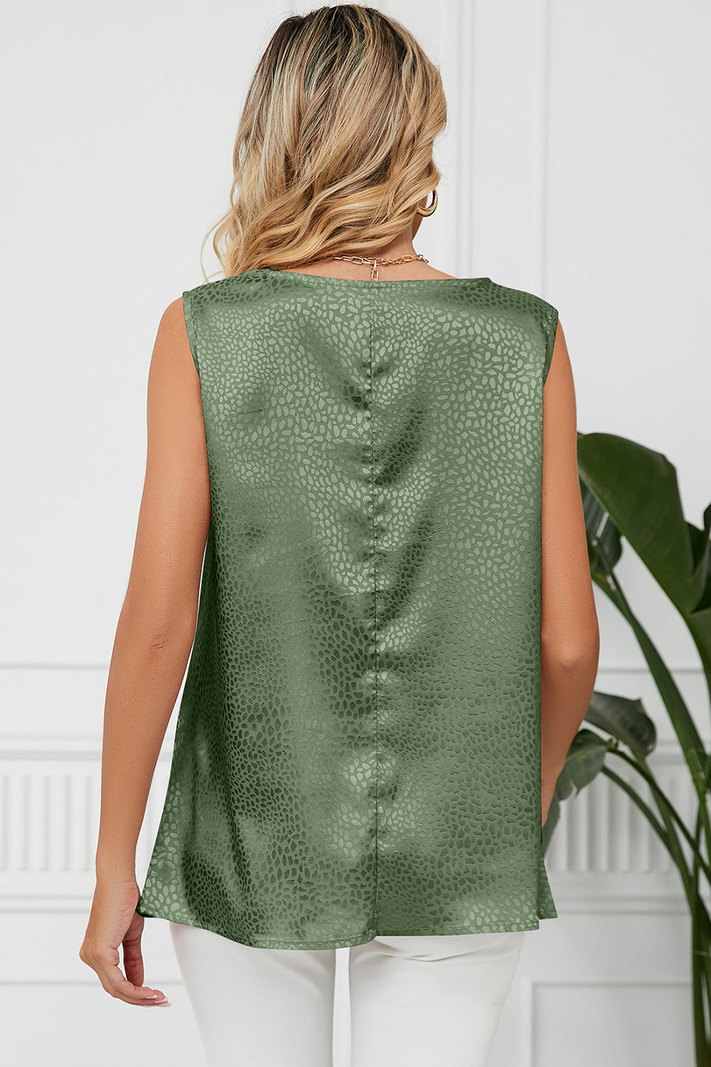 Matcha green jacquard tank top with drape neckline and sleeveless cut.