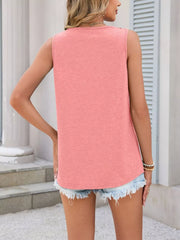 Coral sleeveless tank top with lace trim detail and a relaxed fit.