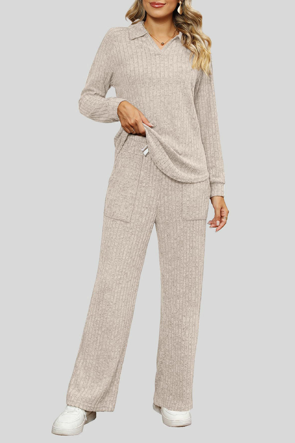 Tan ribbed knit lounge set with collar, long sleeves, and wide leg pants with pockets.