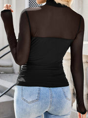 Black sheer mesh high neck maternity shirt with long sleeves and a solid bodice.
