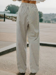 Black and white striped wide-leg drawstring trousers with elastic waistband