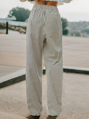 Black and white striped wide-leg drawstring trousers with elastic waistband