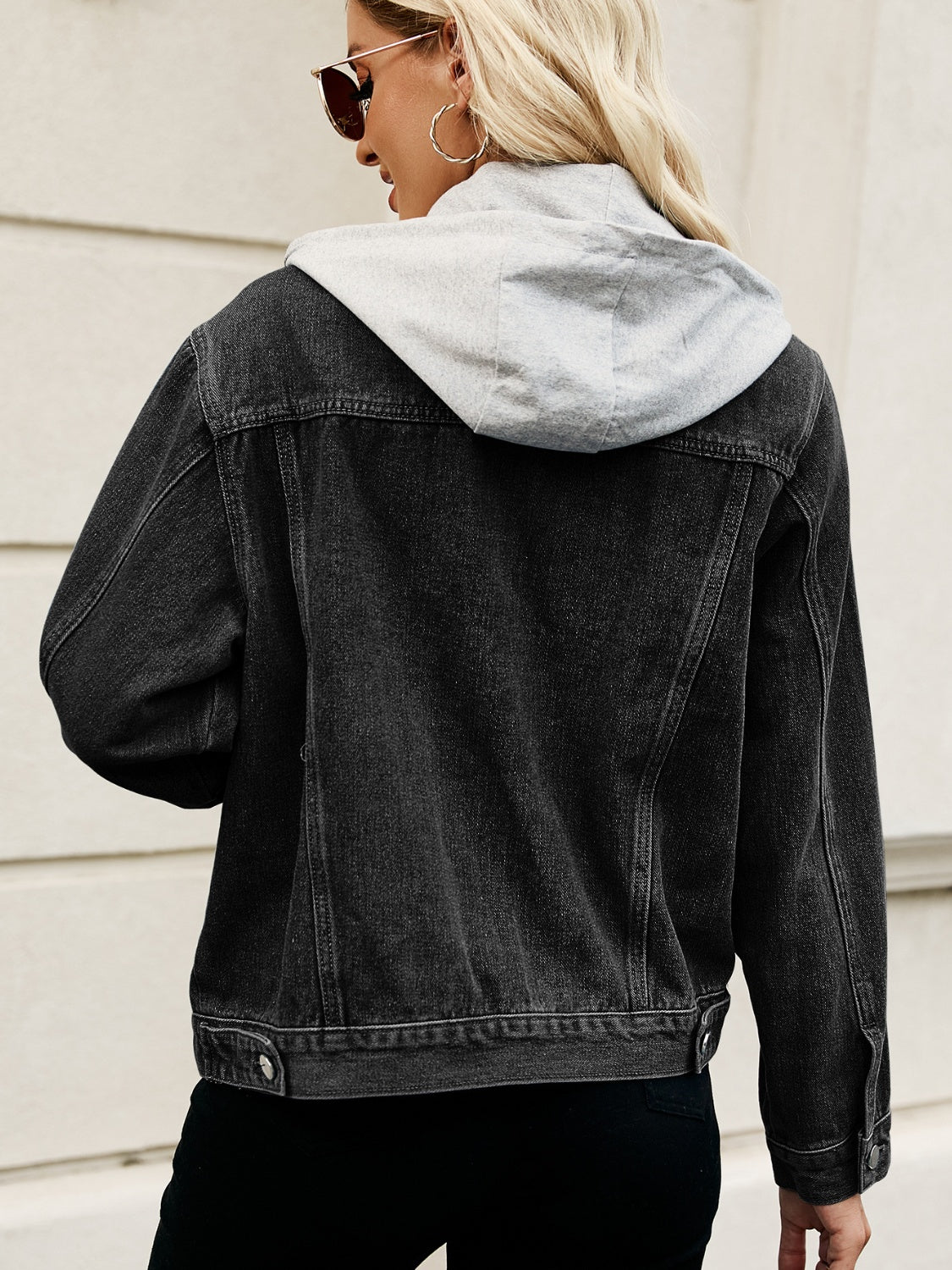 Black denim jacket with contrast grey hood, button front, and classic collar.