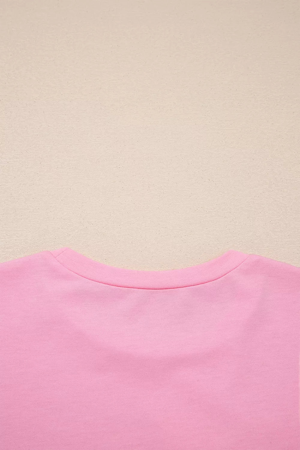 Solid Color Raw Edge Bow Patch Loose T Shirt in Pink, fabric detail