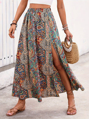 Paisley print maxi skirt with slit in multi-color, bohemian style.